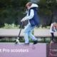 Man performing tricks on best pro scooters